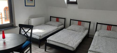 Ein Bett oder Betten in einem Zimmer der Unterkunft Templerhaus Boppard