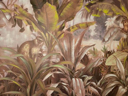 a painting of a monkey in the jungle at AirPort NOA Modern Home in Fiumicino