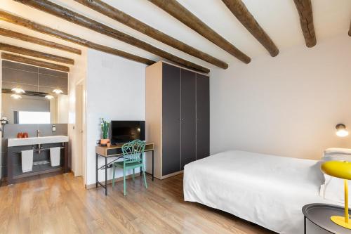 Ένα ή περισσότερα κρεβάτια σε δωμάτιο στο Hostal Pichorradicas