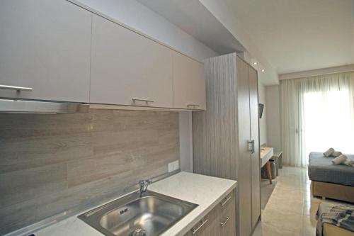 Kuchyň nebo kuchyňský kout v ubytování EL MARE ROOMS