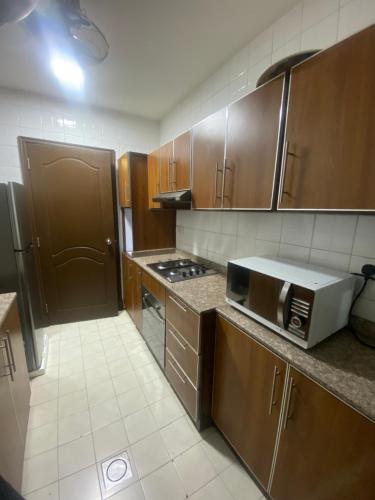 Kjøkken eller kjøkkenkrok på Rabih Furnished Apartments