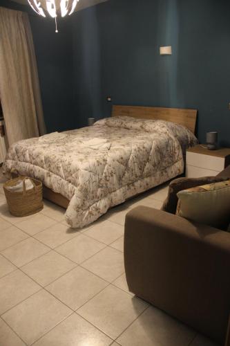 Postel nebo postele na pokoji v ubytování Casa Vacanze Sud e Magia