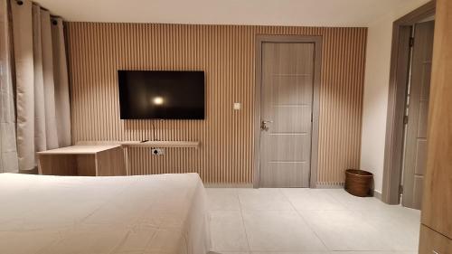 Ένα ή περισσότερα κρεβάτια σε δωμάτιο στο Residence Capri - Mont Choisy