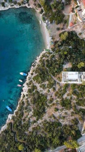 an aerial view of a beach and a body of water at Villa Corali II in Pefkali