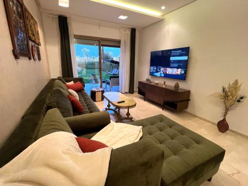 Una televisión o centro de entretenimiento en Luxury apartments prestigia