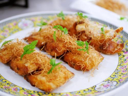 a plate of food with noodles on a plate at Grand Maison W 館山美食倶楽部 in Tateyama