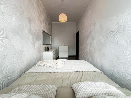 Gulta vai gultas numurā naktsmītnē Apartament 103 Serce Wrocławia