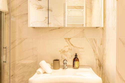 a bathroom with a sink and a shower at TENUTA FOGLIANI Resort & Natural Spa in Visciano