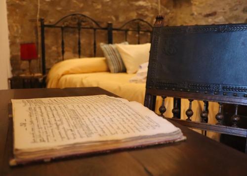 Ένα ή περισσότερα κρεβάτια σε δωμάτιο στο B&B La Voce del Fiume Dimora storica di Charme