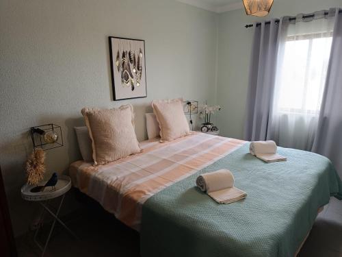 Postel nebo postele na pokoji v ubytování Vale de Sol