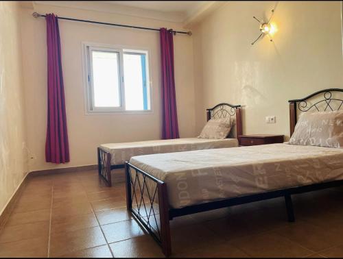 Katil atau katil-katil dalam bilik di Kabila Vista IMMO MARINA Vacances de rêve P