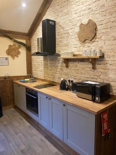 Una cocina o cocineta en Explorers Retreat Matlock Bath