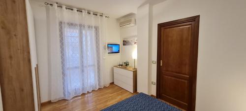 A kitchen or kitchenette at Gruppo Aedes Alghero, Residenza L'Isola - 200 mt dalla spiaggia