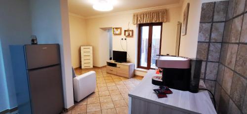 a kitchen with a counter with a appliance on it at Dimora Charme in Monterotondo