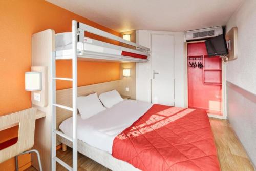a bedroom with a bed and a bunk bed at Premiere Classe Herblay in Herblay