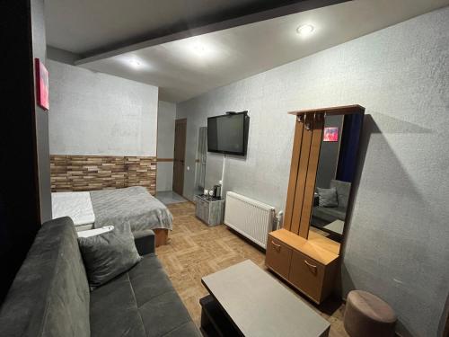 TV a/nebo společenská místnost v ubytování Hotel G&G