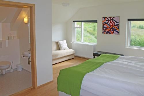 Postel nebo postele na pokoji v ubytování Öndólfsstaðir Farm B&B