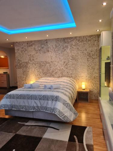 Ένα ή περισσότερα κρεβάτια σε δωμάτιο στο WellandHome- Deluxe Apartment Schechingen