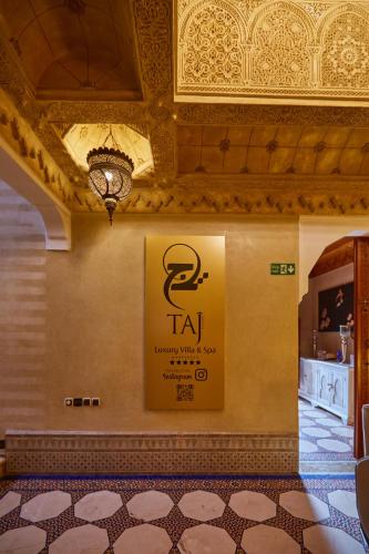 a sign on the wall of a restaurant at Villa Taj Sofia & Spa in Marrakech