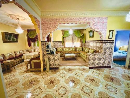 a large living room with a couch and a table at Tanja tanger moroco in Tangier