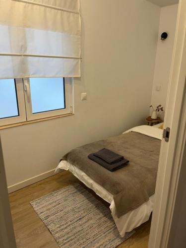 Ένα ή περισσότερα κρεβάτια σε δωμάτιο στο Hola Hostel Alicante