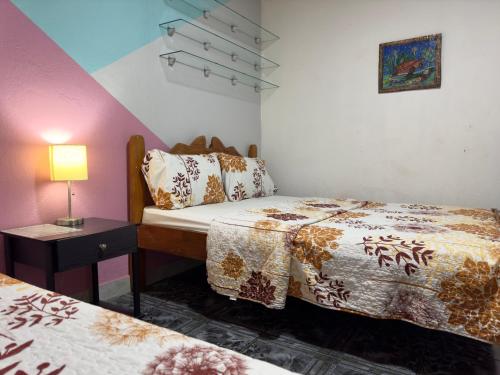 Кровать или кровати в номере Casa Quepos