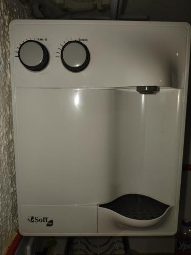 a microwave with two dials on top of it at AP da Cris cabo frio in Cabo Frio
