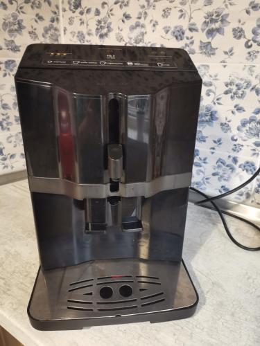 a coffee maker sitting on top of a counter at Апартаменты в центре Ужгорода СКАЛА in Uzhhorod