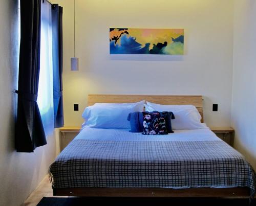 Katil atau katil-katil dalam bilik di Hotel La Tarjea