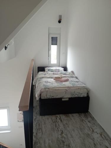 Postel nebo postele na pokoji v ubytování Vila Leona D3