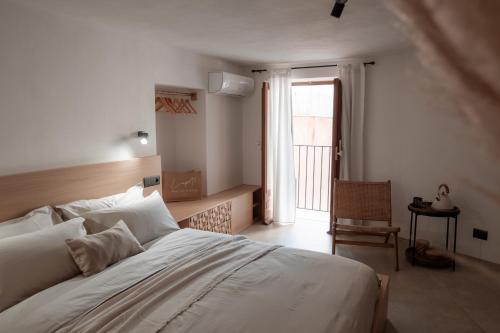 La Petì Small Luxury House Cefalùにあるベッド