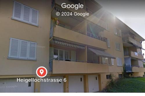 a building with a sign that reads googie at Cheap flat close to Baden, CH in Niederrohrdorf
