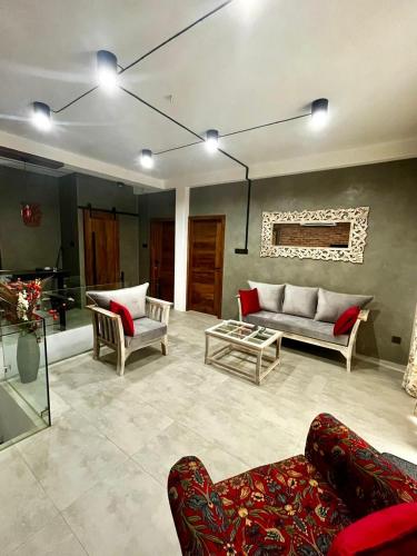 Posezení v ubytování Sai Sruthi Residences