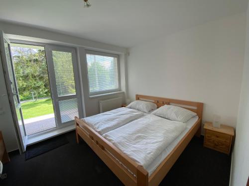 Postel nebo postele na pokoji v ubytování Apartman A1 Golem