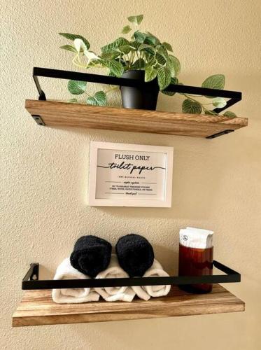 a shelf with three balls on it with a plant at River Rock Chalet :: Hot Tub, Pets, Stevens Pass in Skykomish