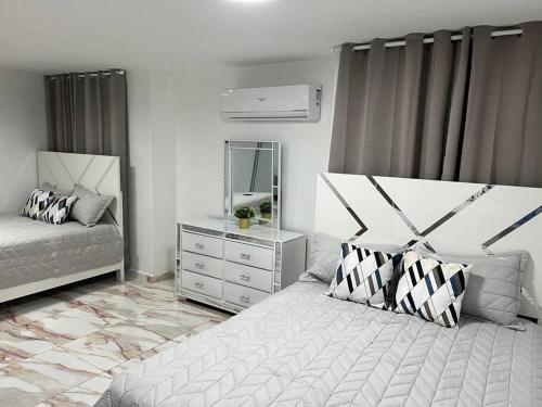 Postel nebo postele na pokoji v ubytování Moderno Apt en la ciudad