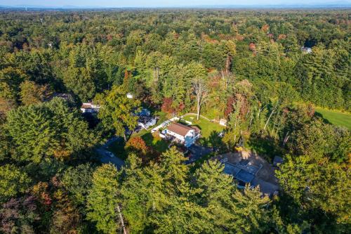 an overhead view of a house in the forest at Game Room+Hot Tub+Pool+King Beds+More in Gansevoort