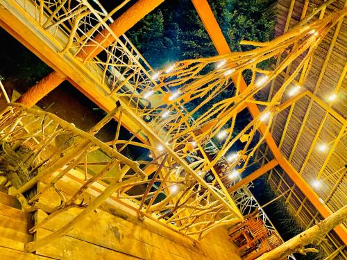 an overhead view of a metal structure with lights at Ima Villa Sigiriya in Sigiriya