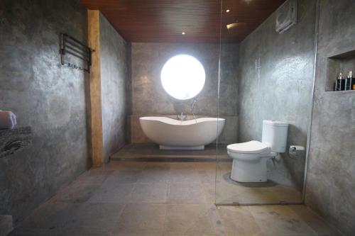 Ванная комната в Villa Taru Jagat