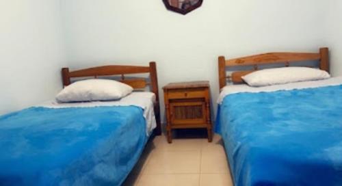 Voodi või voodid majutusasutuse Four Season Hostel toas