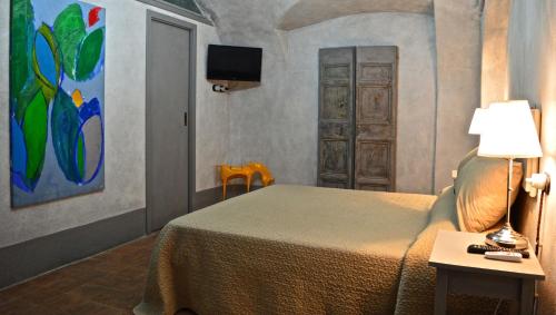 เตียงในห้องที่ Il Viaggiatore 2