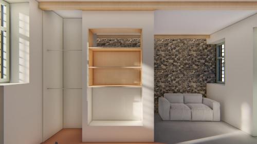 Habitación con estante para libros y sofá en Capella Poulia's Home, Skiathos, en Skiathos