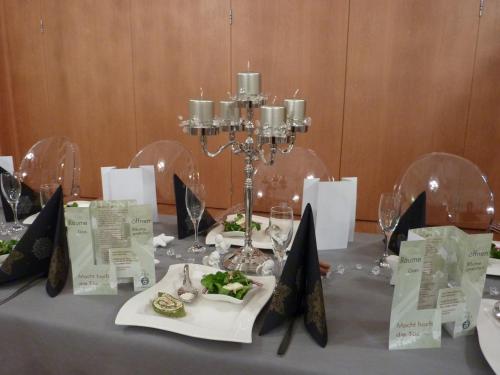 a table with plates of food on top at Kloster Bonlanden in Berkheim