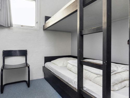 Postel nebo postele na pokoji v ubytování Apartment Brovst VIII