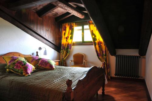 A bed or beds in a room at Locanda Spada Reale