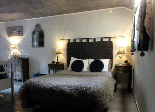 Postel nebo postele na pokoji v ubytování Suite romance