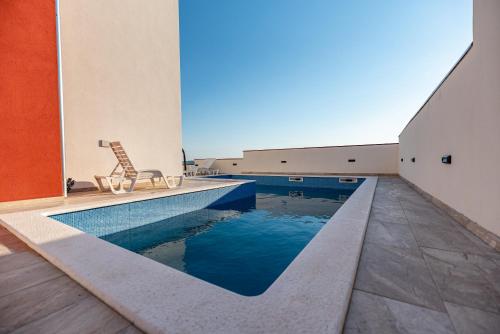 Πισίνα στο ή κοντά στο Olive Bridge Villa