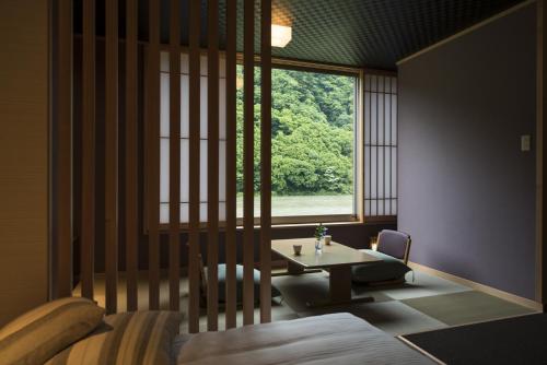 Χώρος καθιστικού στο Takamiya Ryokan Beni
