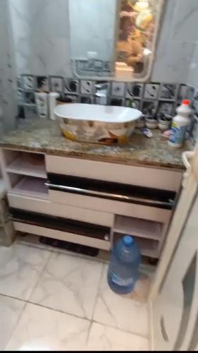 a kitchen counter with a sink and a bowl on it at الاسكندرية المندرة بحرى in Alexandria