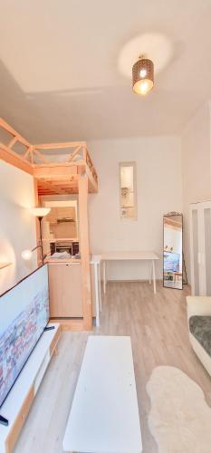 a living room with a bunk bed and a couch at Your Prague Home in Prague